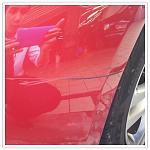 Scratched bumper by metal debris on highway-photogrid_1344505420162.jpg