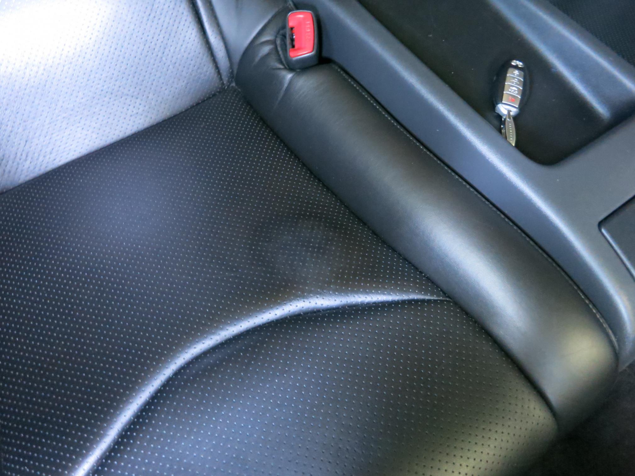 Driver side armrest leather cracking - MyG37