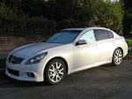 2011 G37 Sedan, 6MT moonlight white-driversidefront.jpg