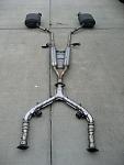 Does anyone else find the sedan horribly plain looking?-stock-oem-exhaust.jpg
