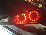 Lighty smoked g37 coupe taillight-fullsizerender.jpg