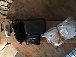 OEM accessories - 18" spare, iPod connector, owners manual booklet, and more-img_1022.jpg