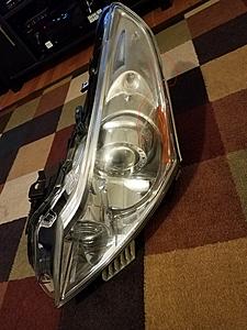 Driver Side Head Light for 2010+ Sedan-head-lamp-with-scratch-and-chip.jpg
