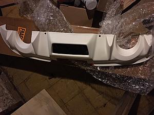 Small part out.  Diffuser, DPE wheels, IPL bumper, test pipes-diffuser.jpg