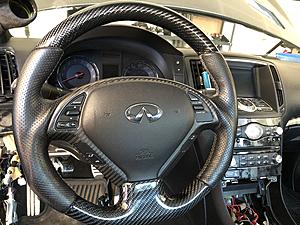 Ivory GT CF Steering Wheel-5ef9ce88-3f59-4dec-8224-9c18573158a2.jpeg