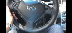Steering wheel wrapped by member Ryne-feedc801-788b-4d34-944e-13ff37abb3a5.jpg