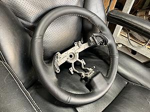 Steering wheel wrapped by member Ryne-e940ea01-823e-4999-bbcc-f8c2001e7e17.jpg