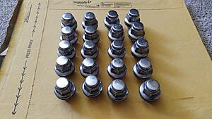 Remaining G37 parts; spacers, lug nuts, center caps, steering wheel cover kit-w21dymll.jpg